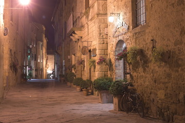 narrow street in the old town of tuscany