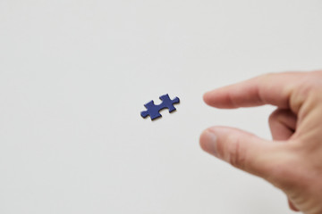 grabbing puzzle piece from right