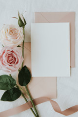 Blank invitation with rose decoration
