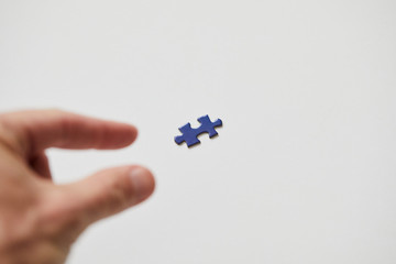 grabbing puzzle piece from left