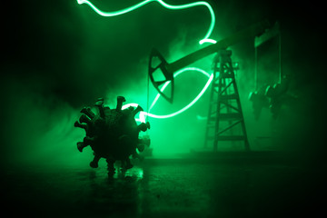 Stock market declining chart and oil pump jack - abstract background