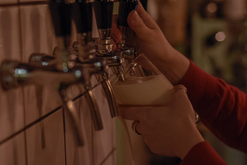 seving draft beer in a glass 
