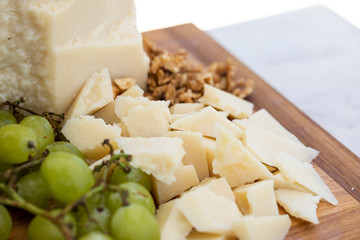 Cheese Platter With parmesan cheese, grapes and walnuts