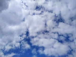 Obraz premium bright blue sky with clouds abstract background