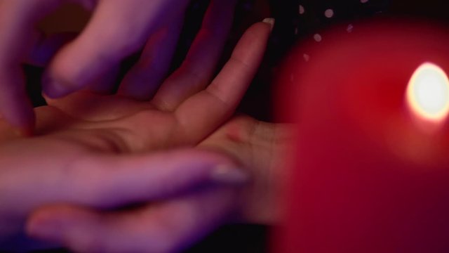 Witch fortune teller lines male palm hand esoteric chiromancy palmistry concept