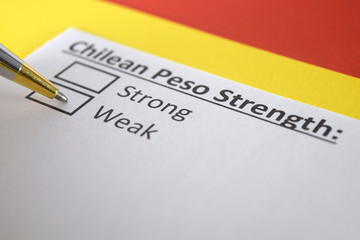 Fototapeta premium One person is answering question about strength of chilian peso.