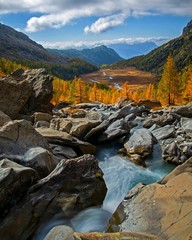 The water of a river that rushes in the Italian Alps. Valtellina 