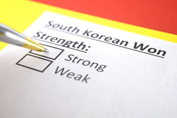 One person is answering question about strength of South Korean Won.