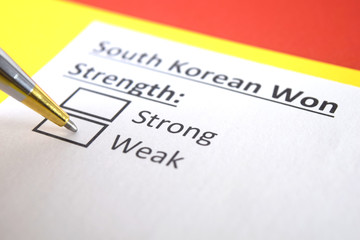 One person is answering question about strength of South Korean Won.