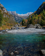 The clear waters of a high mountain lake in the Italian Alps. Valtellina 