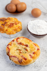 Cooked bread with ingredients Eggs and tapioca flour in a cup.