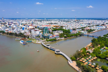 Top view aerial view Love bridge or Ninh Kieu wark bridge Can Tho City, Vietnam with development...