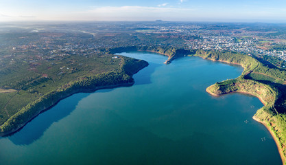 Aerial view of  To Nung lake or T’nung lake near  Pleiku city, Gia Lai province, Vietnam. To Nung lake or T’nung lake on the lava background of a volcano that has stopped working