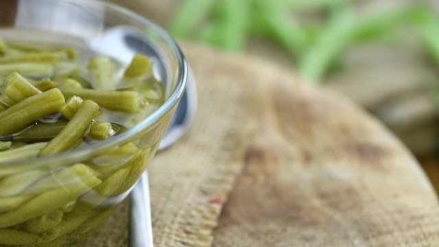 Preserved Green Beans on a rotating plate (seamless loopable; 4K)