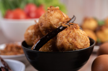 Boiled eggs stir-fried with tamarind sauce.