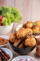 Boiled eggs stir-fried with tamarind sauce.