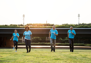 Group of happy and diverse volunteers