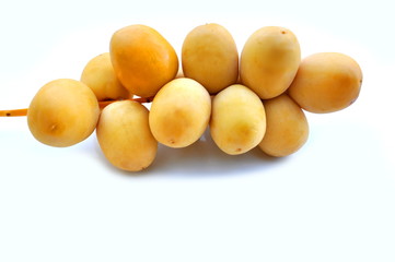 Fresh dates isolated on white with copy space