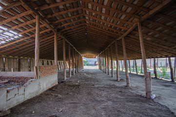 Fototapeta na wymiar old wooden barn abandoned business