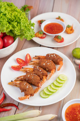 Shrimp wrapped pork cutlets arranged beautifully.