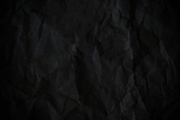 Black textured paper background