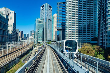 Japan. Train on the background of skyscrapers in the capital of Japan. Transport in Tokyo. Transport network of roads and Railways. Different types of transport. Travel to Tokyo.