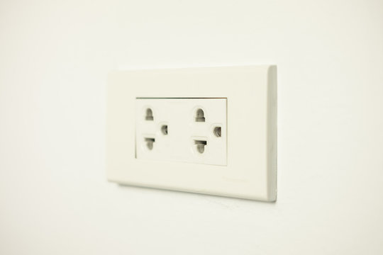 electrical house soket on white wall