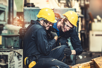 Senior male worker accident in factory.Maintenance worker in the control room of factory.Safety first concpet.
