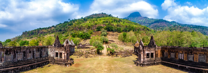 Fototapeta na wymiar Wat Phou is a relic of a Khmer temple complex in southern Laos. Wat Phou is located at the foot of Phou Kao Mountain, Champasak Province, near Mekong River. Aerial view
