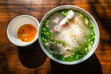 Bun Quay Vietnamese food or Quay rice noodle on wood background, famous food at Phu Quoc island, Kien Giang, Vietnam.