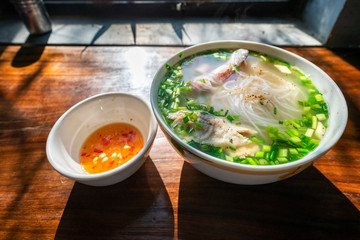 Bun Quay Vietnamese food or Quay rice noodle on wood background, famous food at Phu Quoc island, Kien Giang, Vietnam. 