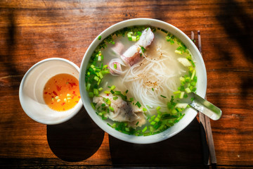 Bun Quay Vietnamese food or Quay rice noodle on wood background, famous food at Phu Quoc island, Kien Giang, Vietnam.