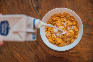 Bowl of corn flakes with milk