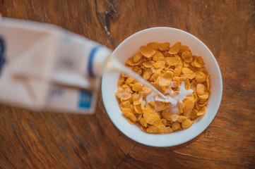 Bowl of corn flakes with milk