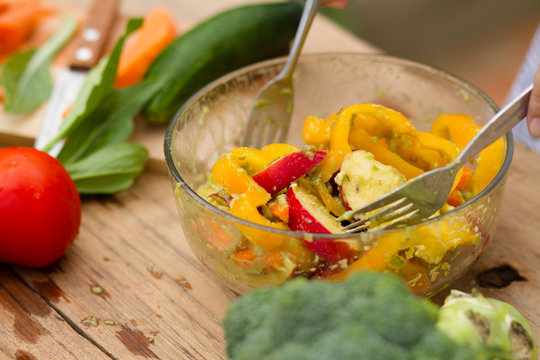 Rookie Chef Cooking A Disgusting Vegetable Salad At Home Kitchen, Fail Cooking Concept.