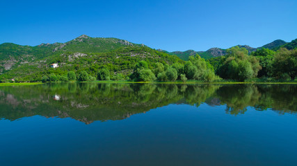 Obraz na płótnie Canvas View of Skadar Lake near Crnojevica river, Rijeka Crnojevica, Montenegro.