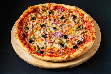 pizza on the black background
