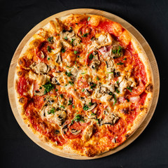 pizza on the black background
