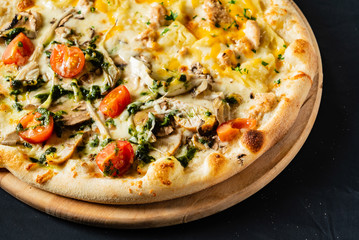 pizza on the black background