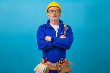 adult man with clothing and equipment for construction work, laborer