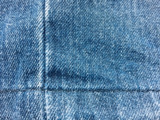 Naklejka premium Jeans fabric texture background