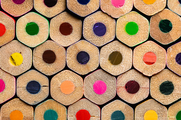 A macro of a very OCD orderly stack of  unsharpened colored pencil ends.  Sharp and Highly Detailed with a shallow depth of focus.