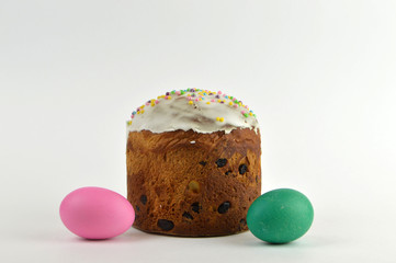 
Fresh Easter cake with eggs lies on a white background