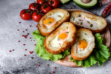 Delicious breakfast with grunts, eggs, avocado and cherry tomatoes
