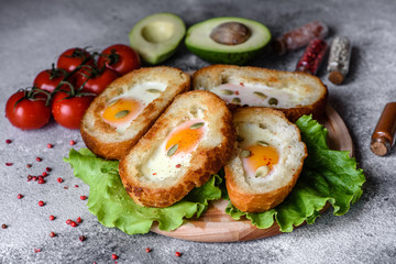 Delicious breakfast with grunts, eggs, avocado and cherry tomatoes