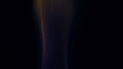 Macro photo of Bonfire sparks. Fire Flames bursts, blasts. Explosion micro sparkles. Mini Fireworks. Shooting on Red camera still on black background. Spark poster, banner, wallpaper, texture.