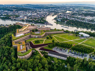 Aerial View of Ehrenbreitstein fortress and Koblenz City in Germany during sunset - 341196740