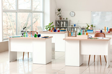 Interior of classroom prepared for chemistry lesson in modern school