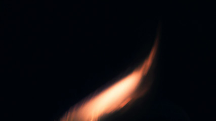 Macro photo of Bonfire sparks. Fire Flames bursts, blasts. Explosion micro sparkles. Mini...