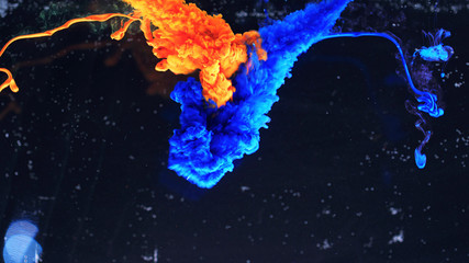 Macro photo shoot of colorful Ink in water. Power magic multi color Underwater Paint Drops...